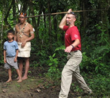 the target is a soft banana tree stump, and the young Waorani woman pegged it every time
