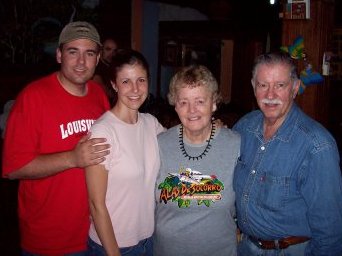 Robert and Jennifer stand with Jean and Byron